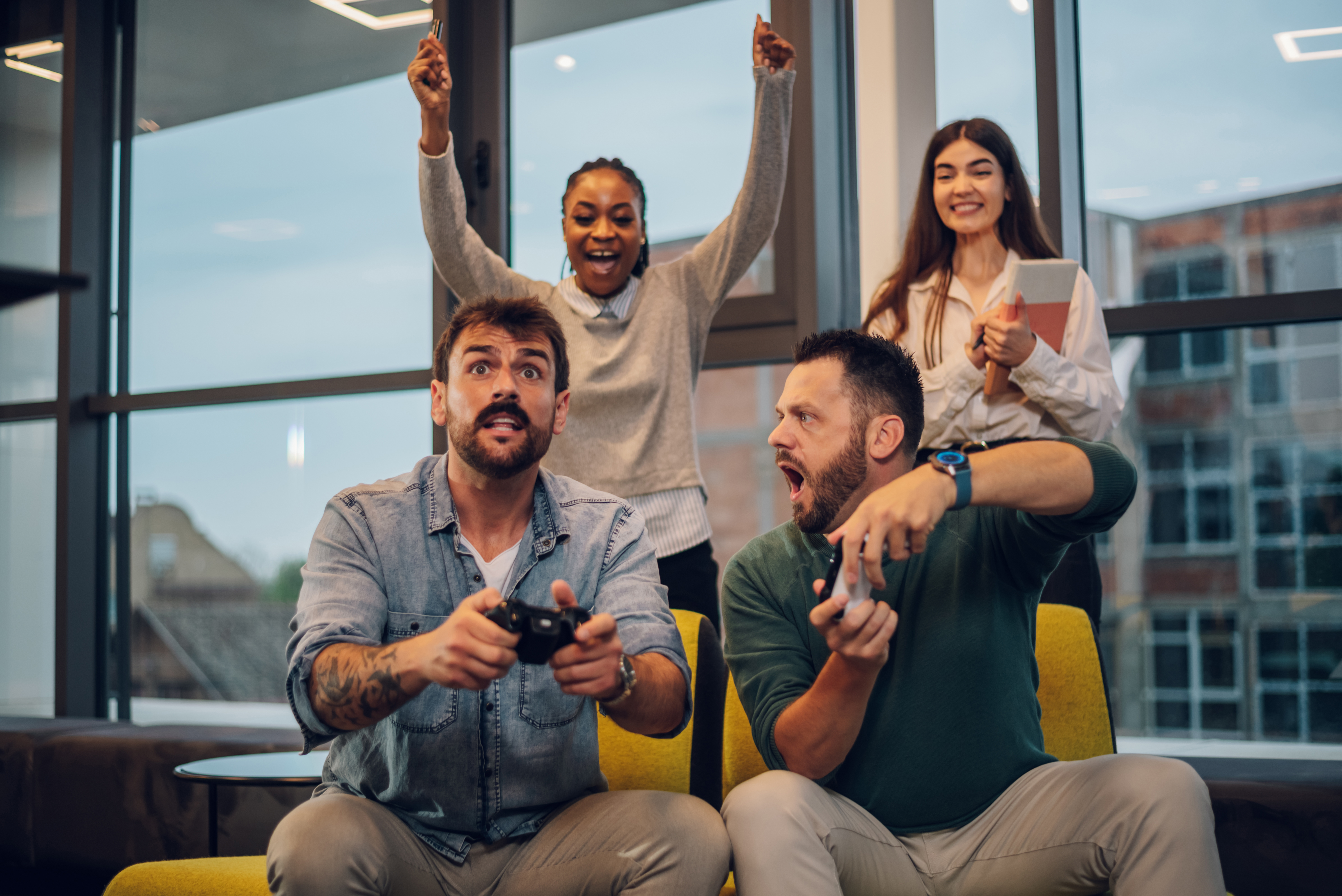 colleagues-celebrating-success-in-a-modern-office-2026-03-25-01-23-10-utc