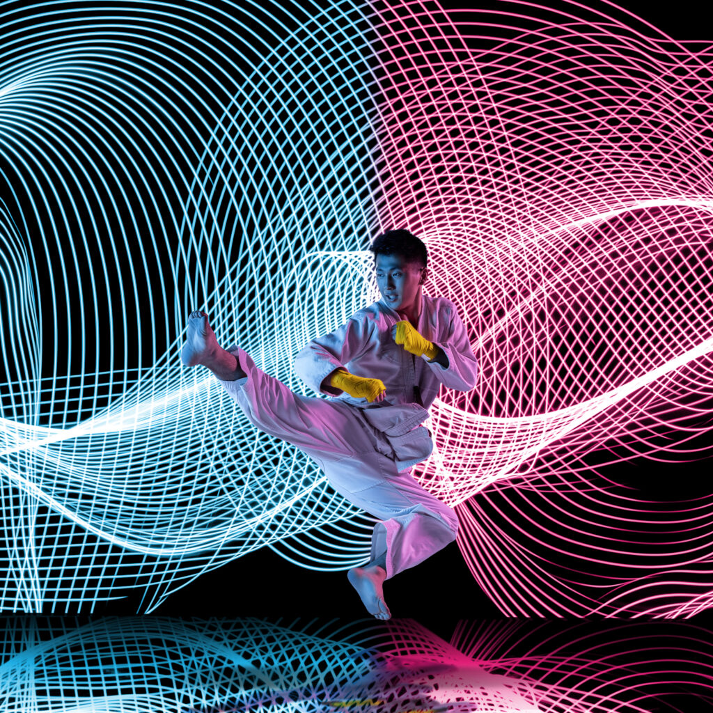 person-in-martial-arts-stance-with-neon-lights-2026-03-09-22-25-54-utc