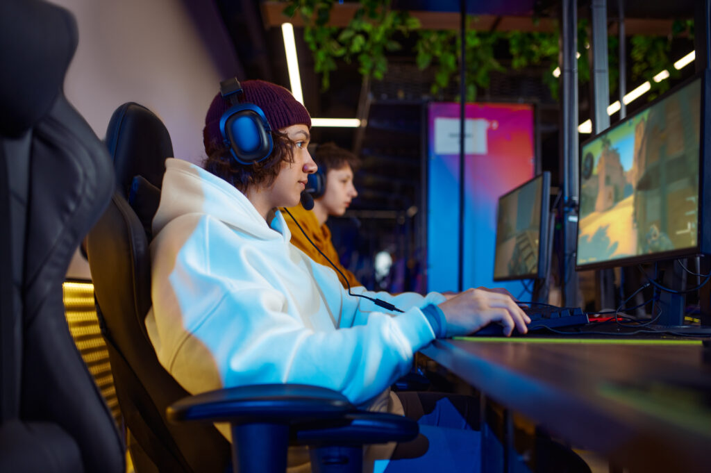 two-young-gamers-in-headsets-play-in-video-game-cl-2026-01-06-09-10-53-utc